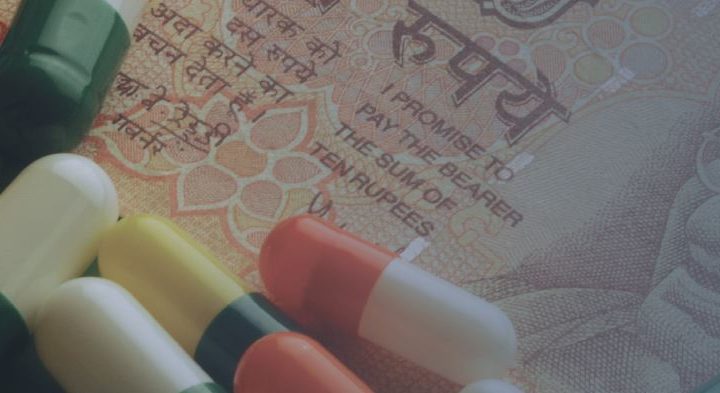 medicine capsule on an Indian Rupee note