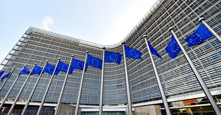Row of EU Flags in front of the European Union Commission building in Brussels